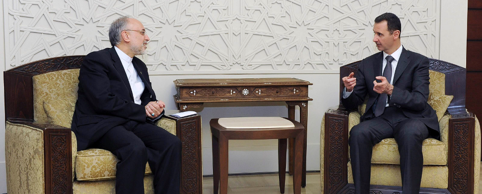 Der syrische Präsident Baschar al-Assad mit dem früheren iranischen Außenminister Ali Akbar Salehi.