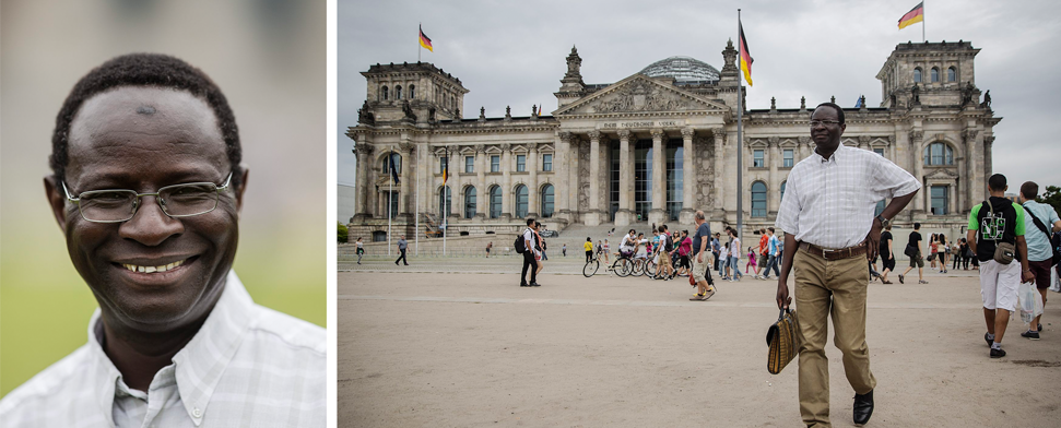 Karamba Diaby (spd) läuft am 18. August 2013 am Reichstag in Berlin vorbei.