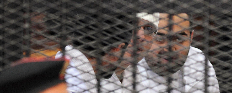 Die drei Revolutionsaktivisten in Ägypten, die zu drei Jahren Gefängnis verurteilt worden sind.