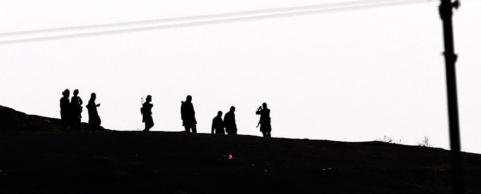 Members of Islamic State (IS) on the Syrian side of the border with Turkey, near Sanliurfa, Turkey, 06 October 2014.