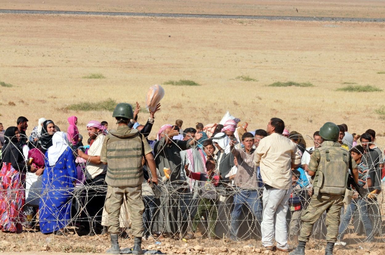 Flüchtlinge aus Syrien an der türkisch-syrischen Grenze